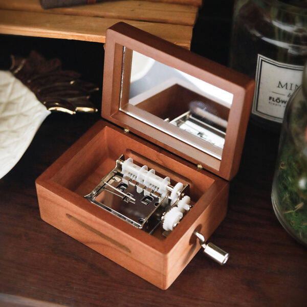 Hand-cranked paper music box